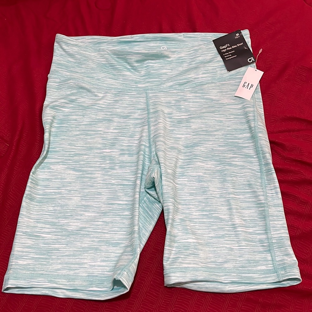 Gap Fit High Rise Bike Shorts  color light green with white.